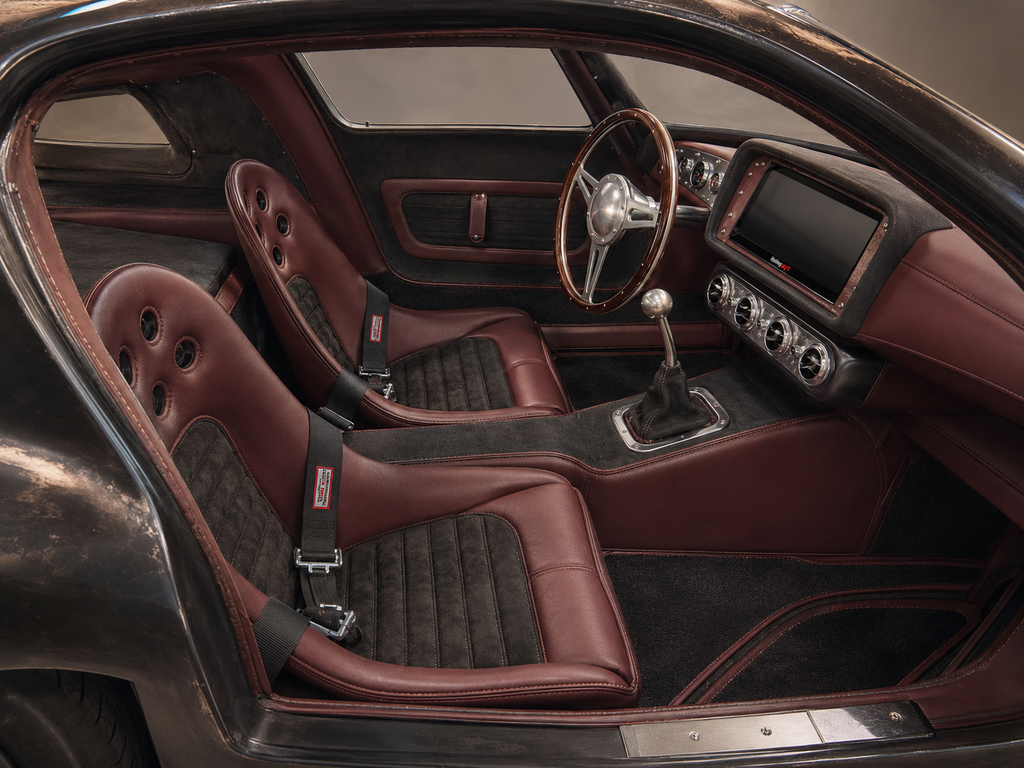 Banshee interior — hand-trimmed leather cockpit with Moto-Lita wheel