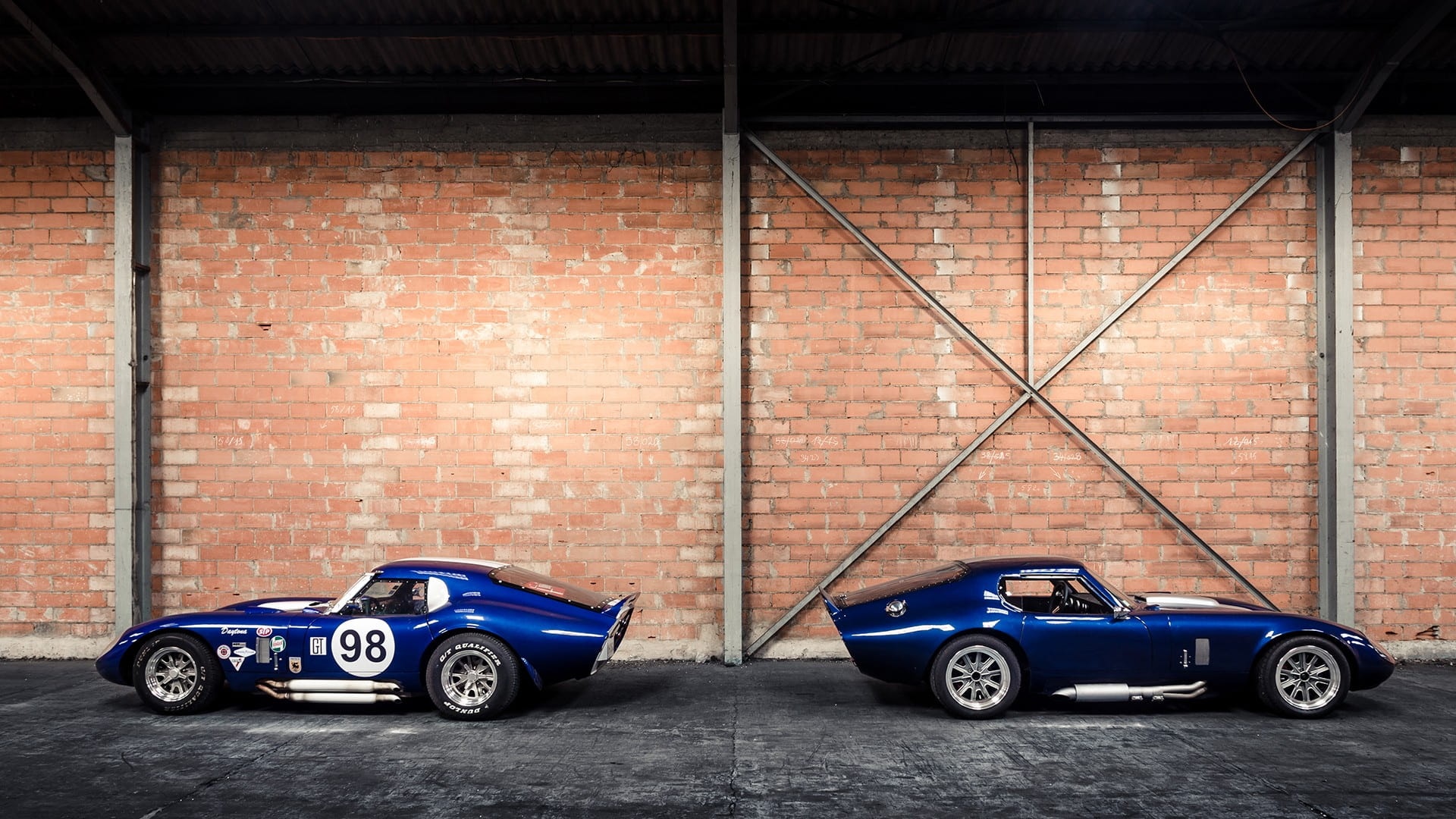 Dual Cobra Daytonas parked back to back